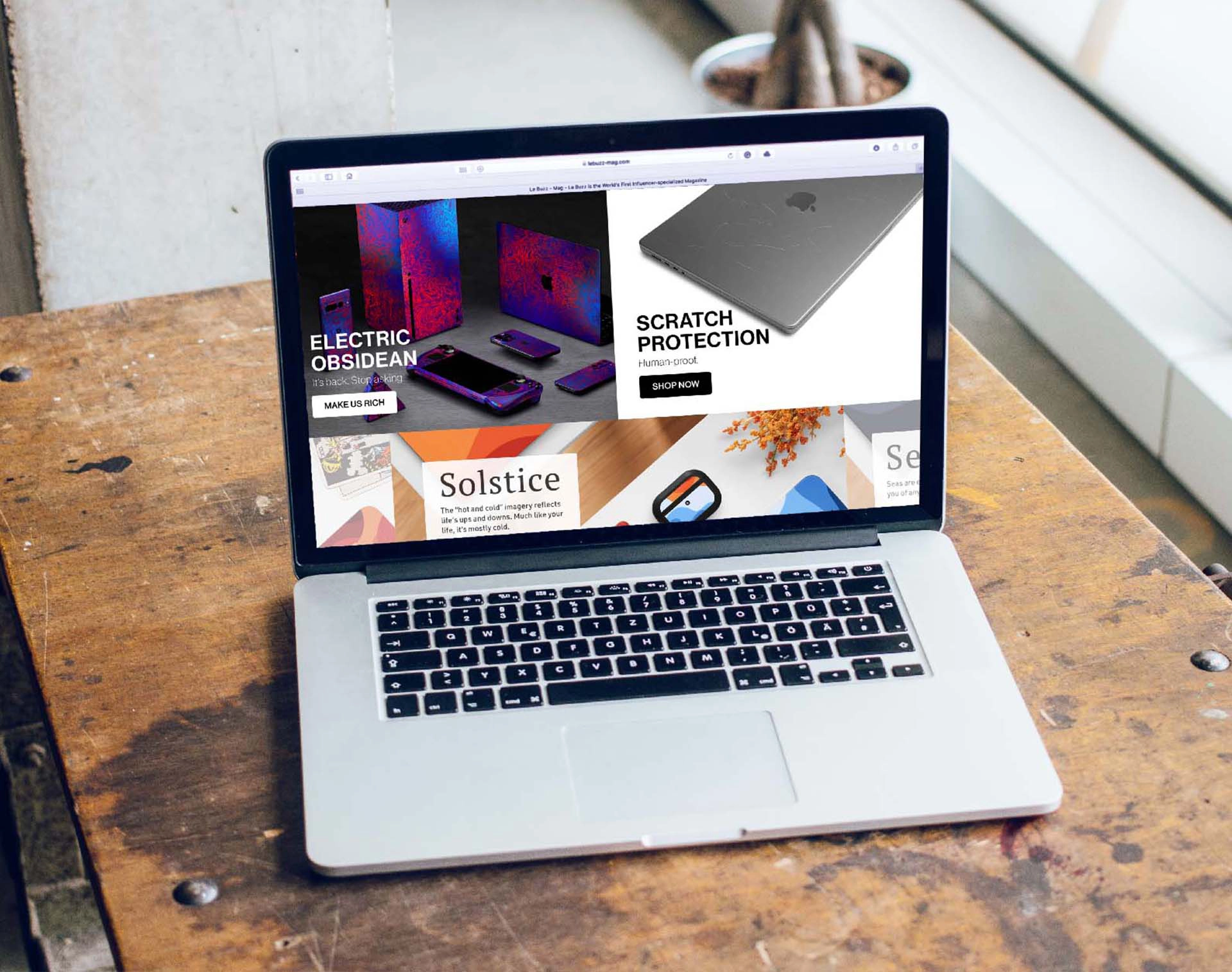 showcasing a phone case website on a laptop screen